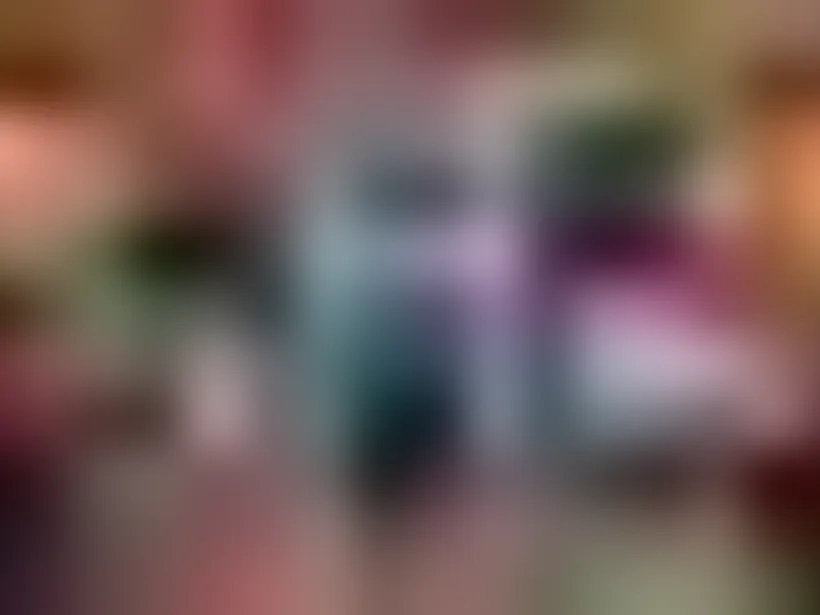 Event photo booth setup with props and gallery visuals