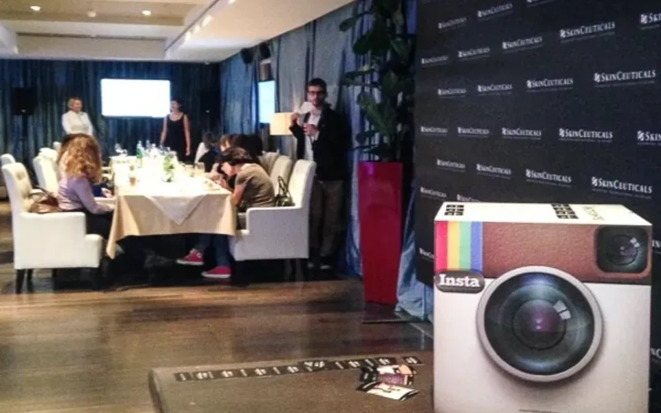 Activation area with branded backdrop and printer workflow