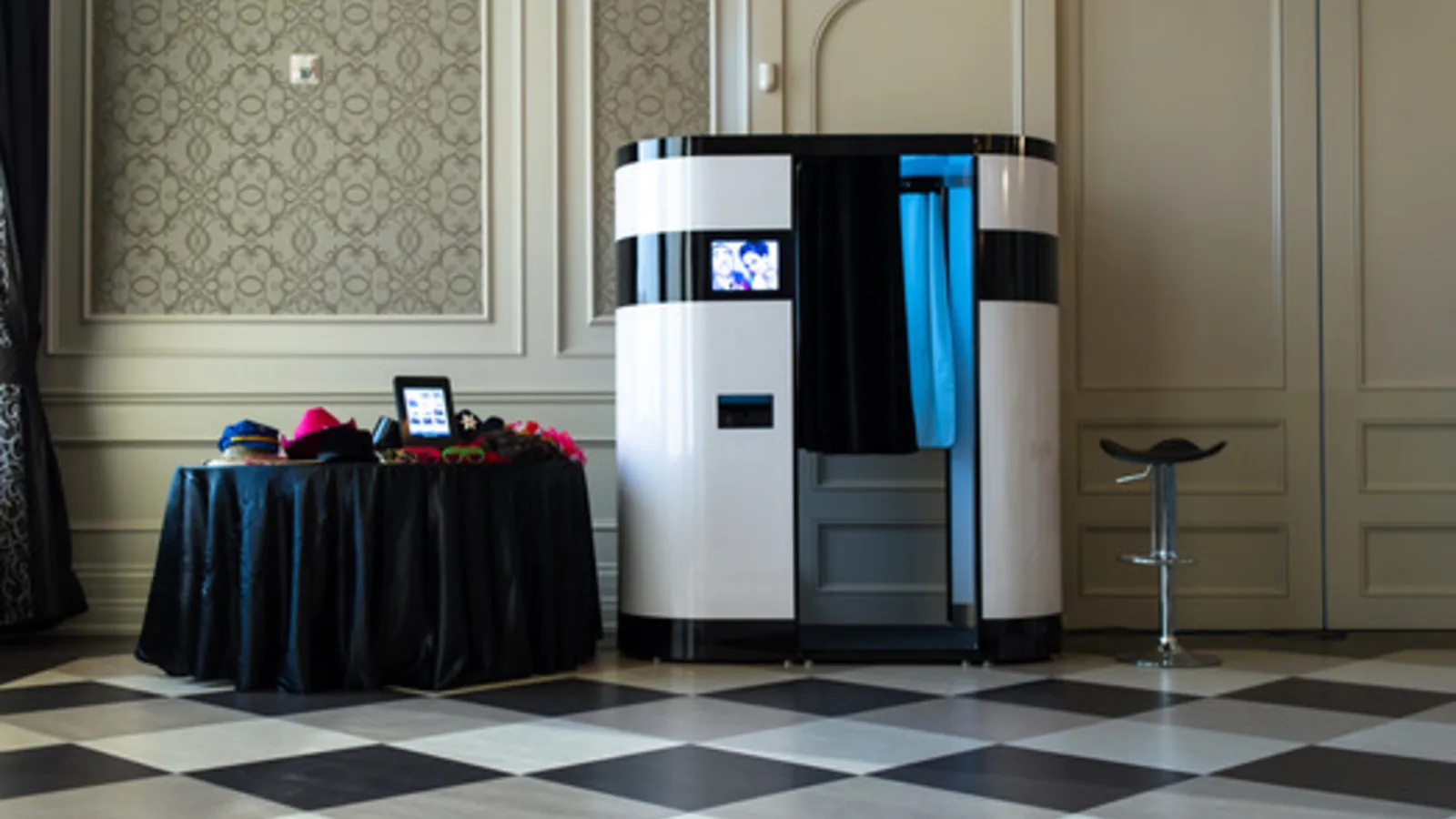 Photo booth installed in a ballroom with controlled front lighting